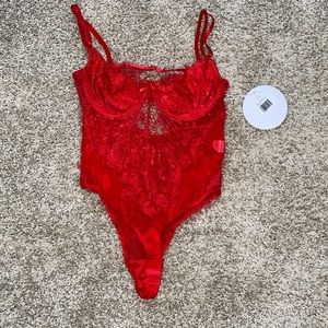 Red lace body suit